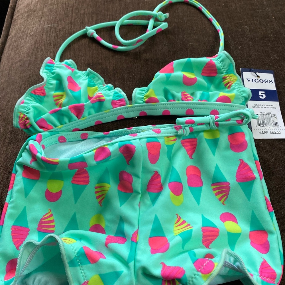 Girls 2 piece swimsuit. New with tags. Size 5